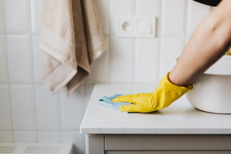 preventing mold groth on bathroom surfaces